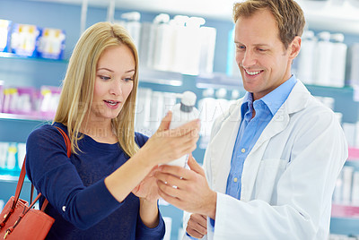 Buy stock photo Shot of a clinician and customer standing in a cosmetics store