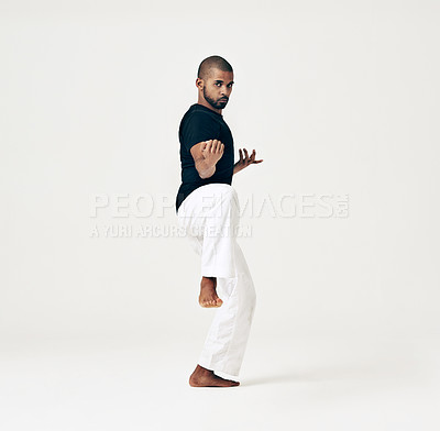 Buy stock photo Karate, man and portrait of exercise in martial arts training or challenge with hands on white background. Studio, dojo and person with skill in self defence technique or practice action of fight