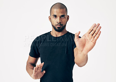Buy stock photo Tai chi, portrait and man in martial arts training or calm movement with hands on white background. Healthy, workout and person with skill in self defence technique or practice taekwondo exercise