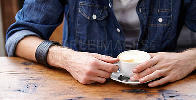 Buy stock photo Coffee cup, wooden table and hands of cafe person, relax customer or client holding latte, espresso or morning drink. Tea mug, hospitality and consumer sitting in startup restaurant, diner or store