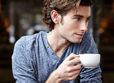 Buy stock photo Cafe, relax and man with a coffee cup, thinking and breakfast with green tea, hot chocolate or chai latte in France restaurant. Decision, ideas and male person with warm cappuccino, beverage or drink