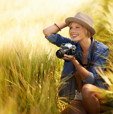 Buy stock photo Woman, camera and photography with happy travel, vacation and holiday with wheat field and plants. Nature, photographer and outdoor with blog and countryside with photo for adventure and journey