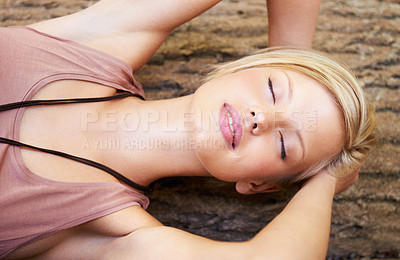 Buy stock photo Woman, relax and tree trunk sleep in environment for resting holiday in nature, countryside or top view. Female person, calm and peaceful or New Zealand forest for traveling, vacation or fresh air