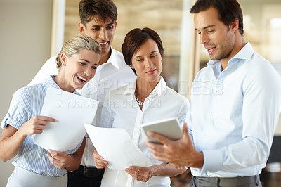 Buy stock photo Happy, business people and documents with tablet for project discussion, meeting or proposal at office. Group, employees or designers with smile on technology for company review or schedule report