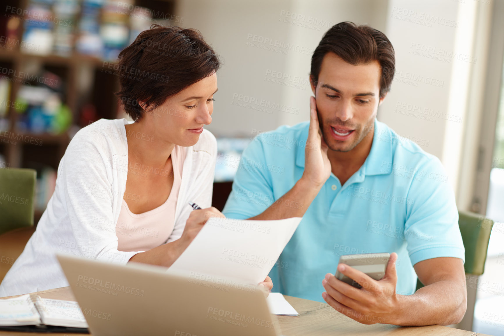 Buy stock photo Couple, calculator and discussion for finance in home, budget planning and bills for taxes. Paperwork, man and woman in living room with expenses, mortgage payment and invoice for asset management