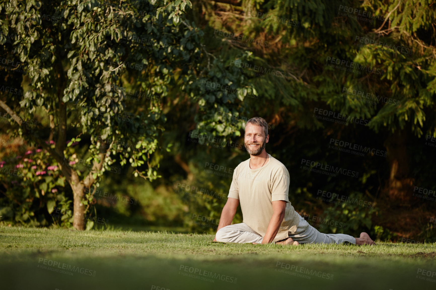 Buy stock photo Full length portrait of a handsome mature man doing yoga in the outdoors