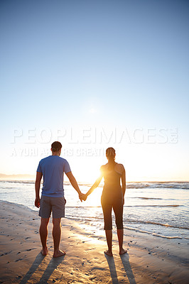 Buy stock photo Love, holding hands and back with couple at beach for valentines day trip, sunset and romance. Vacation, mockup and holiday with man and woman in Seychelles for adventure, honeymoon and travel date