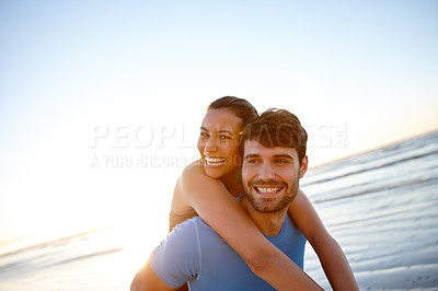 Buy stock photo Portrait shot of a beautiful woman having fun with her boyfriend at sunrise