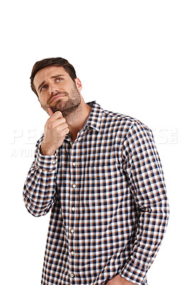 Buy stock photo Studio shot of a handsome young man racking his brain for ideas isolated on white