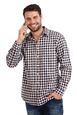 Buy stock photo Studio portrait of a handsome young man talking on his cellphone isolated on white