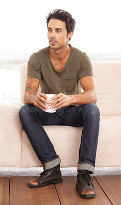Buy stock photo Man, coffee and thinking or serious on sofa in the morning for relax, peace or satisfaction at home. Person, calm or face with espresso, beverage or hot chocolate for rest, wellness or ideas on couch