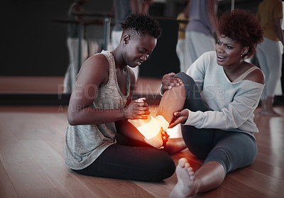Buy stock photo Feet, pain or injury and woman helping friend on floor at fitness studio with burnout or health problem. Female person with exercise partner and red anatomy glow for support, accident and first aid
