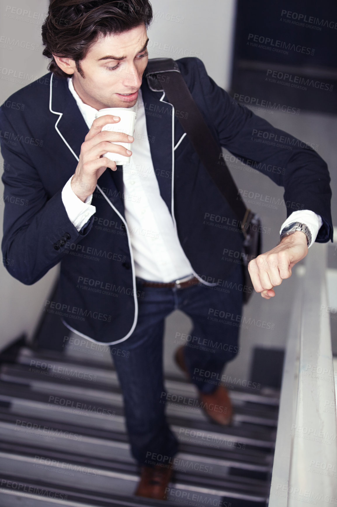 Buy stock photo Coffee, fashion and young man by staircase with a watch checking the time for being late. Latte, walking and handsome male person with casual, formal and classy style for professional career.