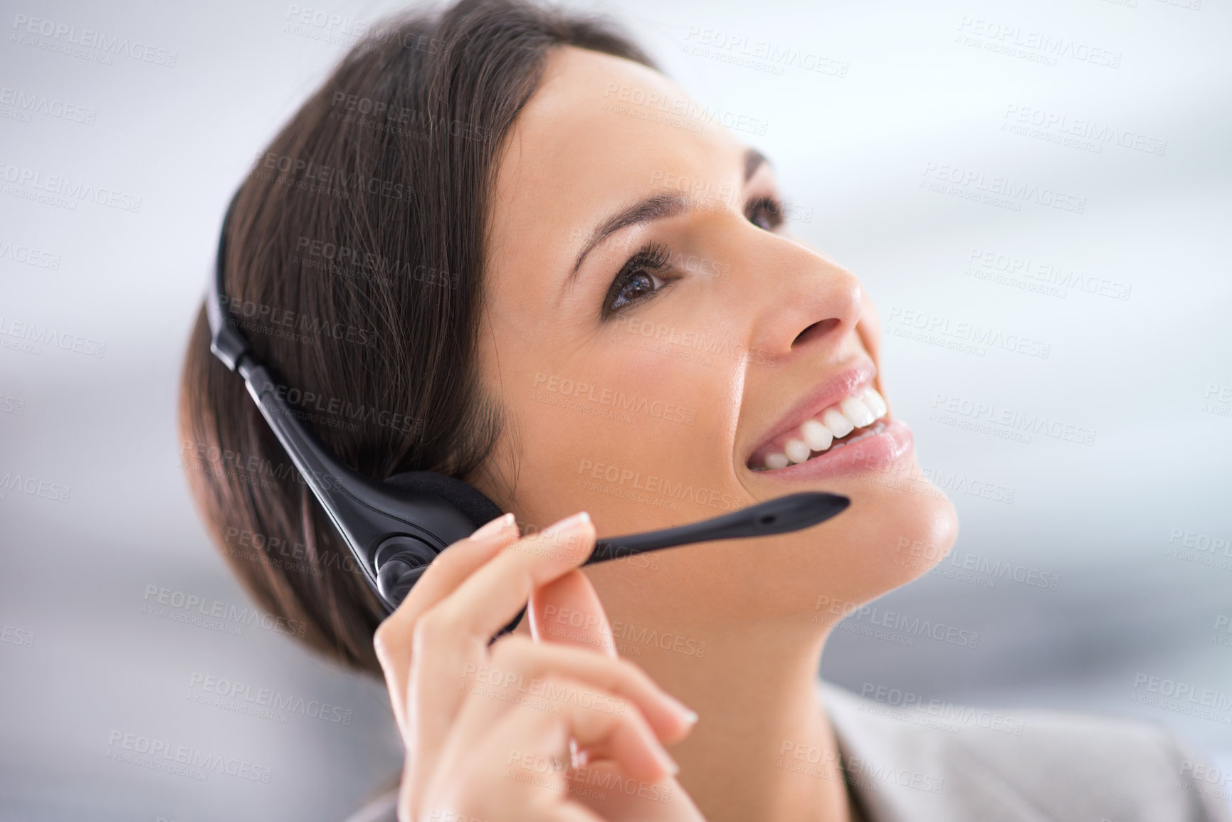 Buy stock photo Call center, woman and smile with vision in office for customer service, communication and tech support. Agent, happy and headset with thinking for consulting, telemarketing or help for clients