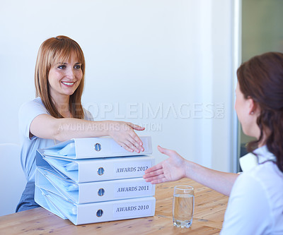 Buy stock photo Women, management and handshake in interview for welcome, onboarding and hiring in office or workplace. Business, professional or people with documents, paperwork or shaking hands in meeting or smile