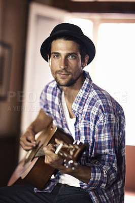 Buy stock photo Guitar, portrait or man in home for music, performance or entertainment with sound, rhythm or talent. Learning solo, artist or creative musician playing an instrument for artistic expression alone