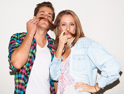 Buy stock photo Funny portrait of cool couple with goofy face, gen z fashion and university culture with crazy hipster youth. Happiness, woman and man with fun at college, hair moustache on white wall background.