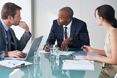 Buy stock photo Planning, serious and crisis with business people in meeting for idea, documents and negotiation. Collaboration, data and leadership with employees in office for project management and brainstorming