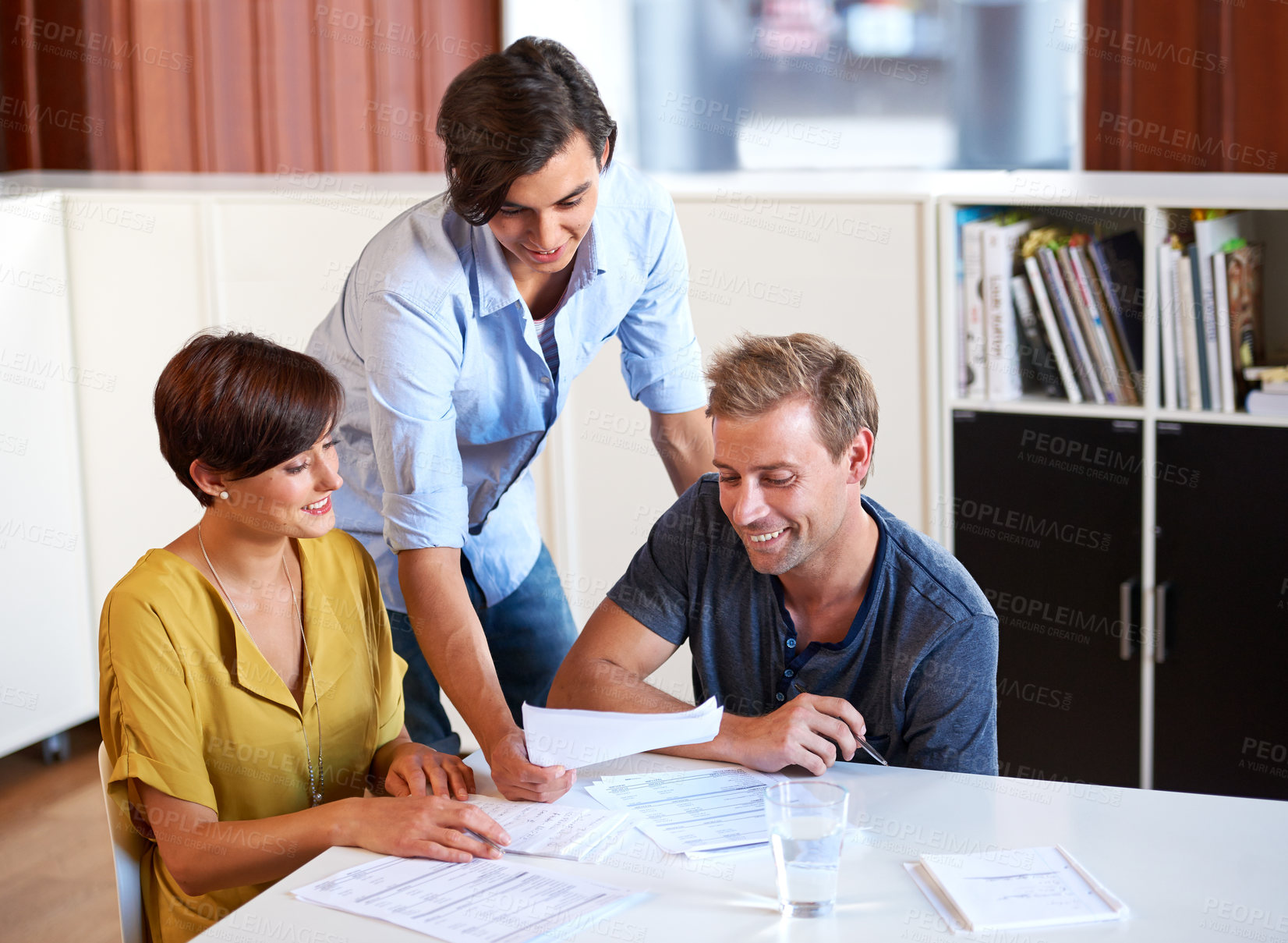 Buy stock photo Business meeting, men and woman with smile for planning, strategy or brainstorming with partnership, collaboration or documents. Employees, people and discussion in office at workplace or company