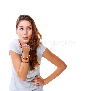Buy stock photo Blowing kiss, happy and woman thinking of mockup space for motivation, marketing and care. Happiness, friendly and model with love, flirty body language and fun on a white background in studio