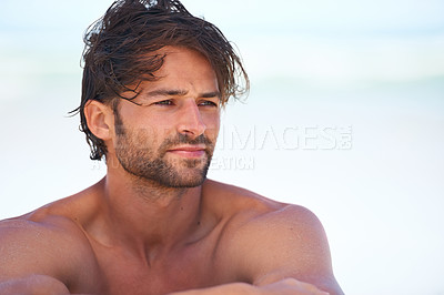 Buy stock photo Face, thinking and shirtless with a man on the beach for freedom, travel or vacation in summer. Nature, idea and wellness with a young person at peace on the coast for a tropical holiday space