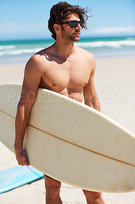 Buy stock photo Summer, travel and a man surfer on the beach for surf, freedom or adventure on vacation. Nature, sand and a young person shirtless with a surfboard by the ocean or sea on a tropical coast for holiday
