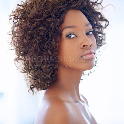 Buy stock photo Shot of a beautiful young woman during her daily beauty routine