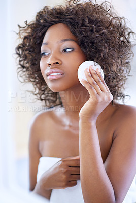 Buy stock photo Bathroom, cotton pad and black woman for beauty, washing face and wellness for morning routine. Dermatology, skincare and person in mirror for facial treatment, makeup and cosmetics for cleaning