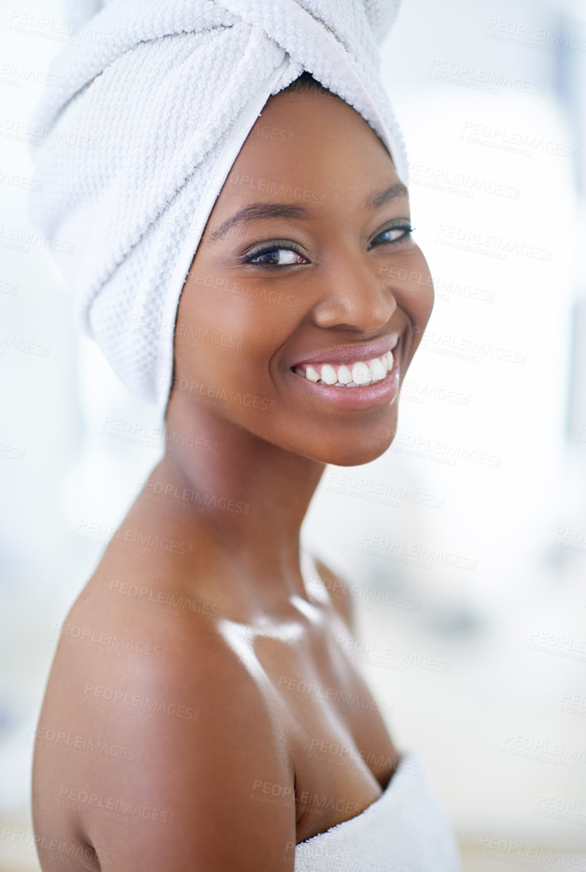 Buy stock photo Happy, portrait and black woman in bathroom for beauty, shower or self care routine in morning. Towel, fresh and African female person with clean, smooth and flawless skin for hygiene at home.