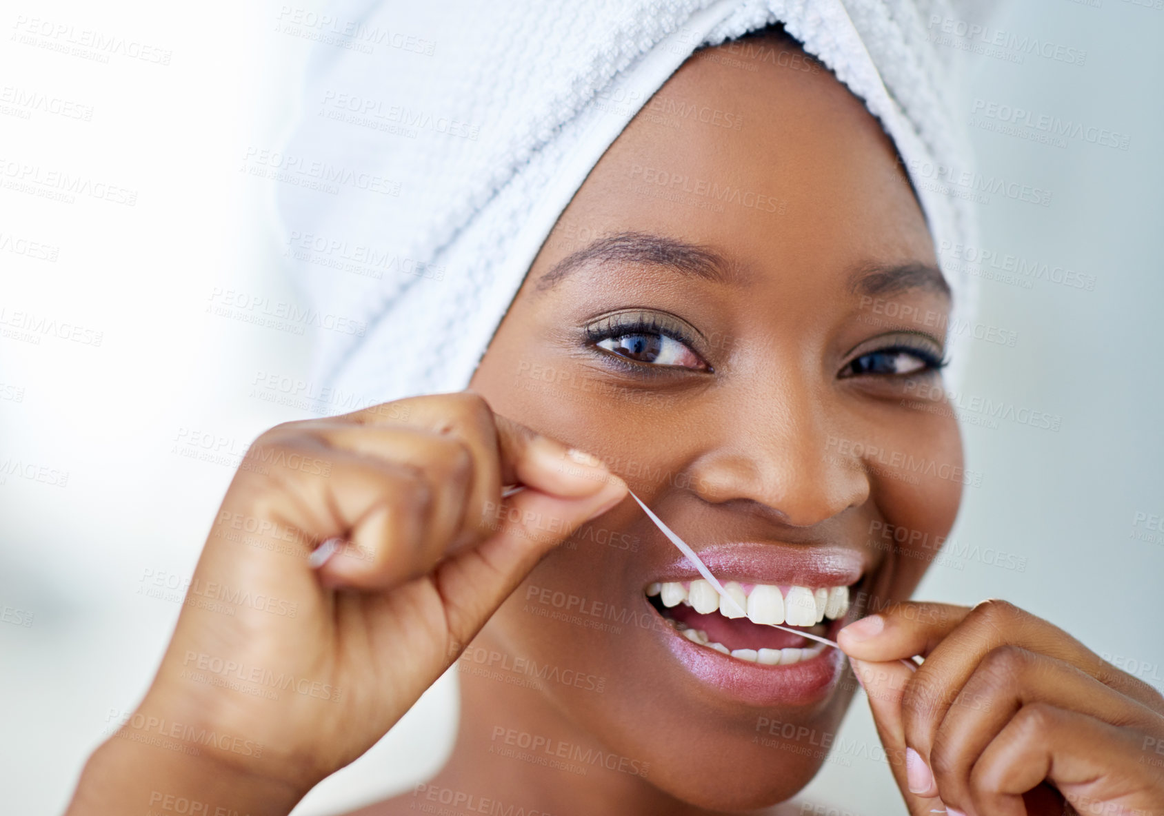 Buy stock photo Dental hygiene, portrait and black woman with floss in bathroom for fresh breath in home. Happy, oral care and African person cleaning teeth with thread for cavity, plaque removal and wellness.