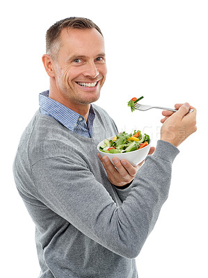 Buy stock photo Portrait, salad and mock up with a man in studio isolated on a white background for health, diet or nutrition. Food, green and vegetables with a handsome mature male eating a meal on blank space