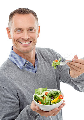 Buy stock photo Salad, vegetable and man studio portrait for healthy food with nutrition for health. Happy model person with vegan lunch or brunch bowl isolated on a white background with a fork for wellness