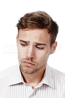 Buy stock photo Cropped studio shot of a broody young man isolated on white