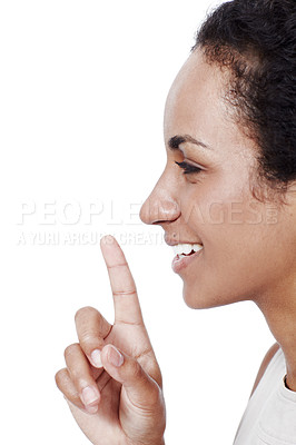 Buy stock photo Secret, face and girl with finger on lips in studio for gossip, mystery or silence emoji on white background. Mouth, hand and model with hush news, whisper or quiet announcement of taboo conspiracy