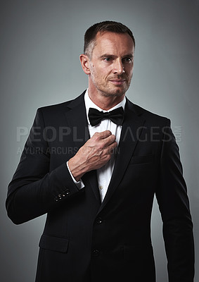 Buy stock photo Fashion, mature man in tuxedo and handsome face, online dating profile isolated on grey background in studio. Luxury, success and rich, elegant celebrity or actor style with date for valentines day.