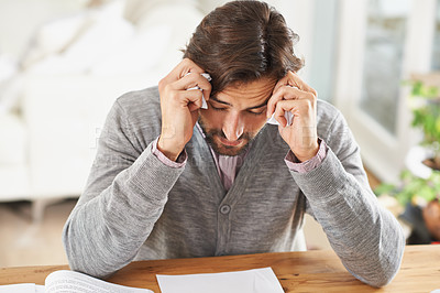 Buy stock photo Writer, man and stress in home office with paper on desk, headache and worried to meet deadline. Author, procrastination and frustrated with work on research for information, writing tips for story 