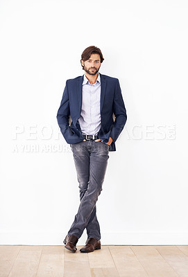 Buy stock photo Confident, portrait and businessman relax in studio on white background or wall with professional fashion. Insurance agent, consultant and person standing with pride in work or career as advisor
