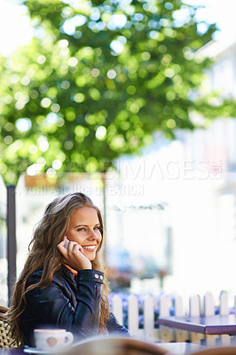 Buy stock photo Happy, phone call and woman outdoor at cafe in summer to relax with espresso, latte or beverage. Girl, smile and sitting or talk at coffee shop in morning with cellphone, communication or contact