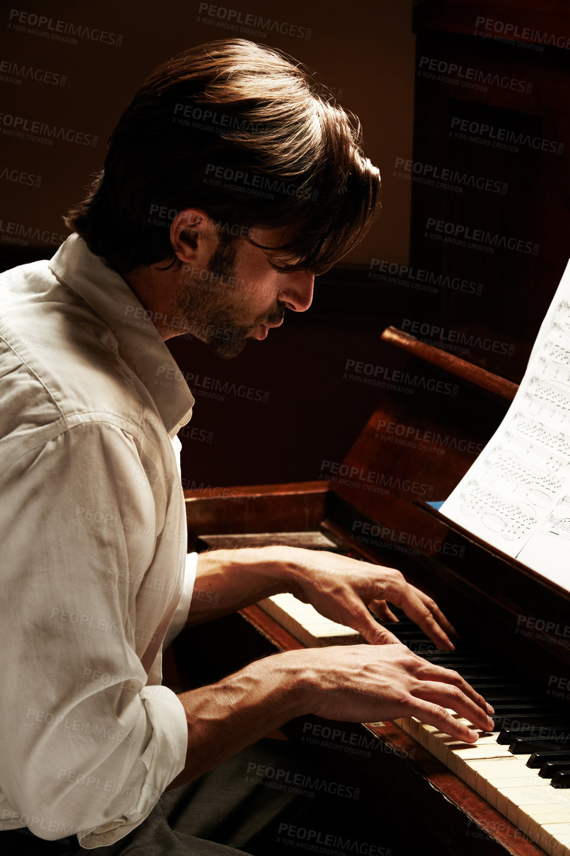 Buy stock photo Profile, creative and man with piano, artist and music with sound, audio and entertainment with performance. Person, player and musician with jazz, performer and listening with celebration or hearing