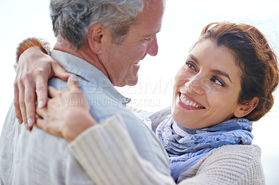 Buy stock photo Couple, smile and hug in outdoors, travel and bonding or love, affection and security in relationship. Mature people, happy and relaxing on vacation, holiday and adventure or getaway, embrace or care
