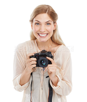 Buy stock photo Portrait, photographer and smile of woman with camera in studio isolated on a white background. Happy face, paparazzi and dslr technology for hobby, take pictures and creative professional photoshoot