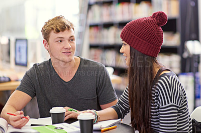 Buy stock photo Students, boy and girl with books in library for assignment, academic research and education. Campus, college or university for knowledge, learning and friends with discussion for essay assessment 