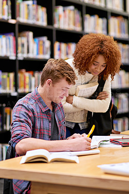 Buy stock photo Shot of students studying in a college library
