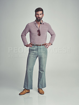 Buy stock photo Retro, fashion and portrait of man with 70s vintage aesthetic in gray background of studio. Smoking, pipe and person with confidence and pride in funky clothes and unique style from past or history