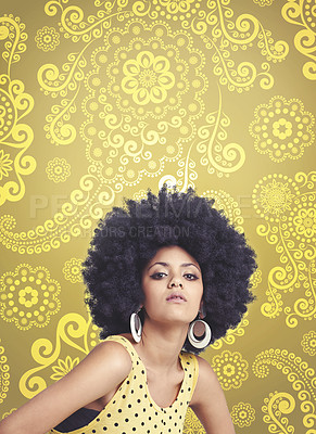 Buy stock photo African woman, afro and vintage in studio, fashion and bold expression on face, unique and dots in clothes. Retro, hair and person with confidence, yellow background and portrait of cool girl