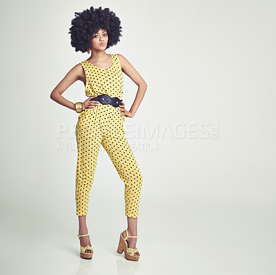 Buy stock photo Black woman, portrait and retro fashion in studio for vintage, unique look and jumpsuit. African girl, stylish and gen x with curly hair afro, confident and pose with white background for mockup