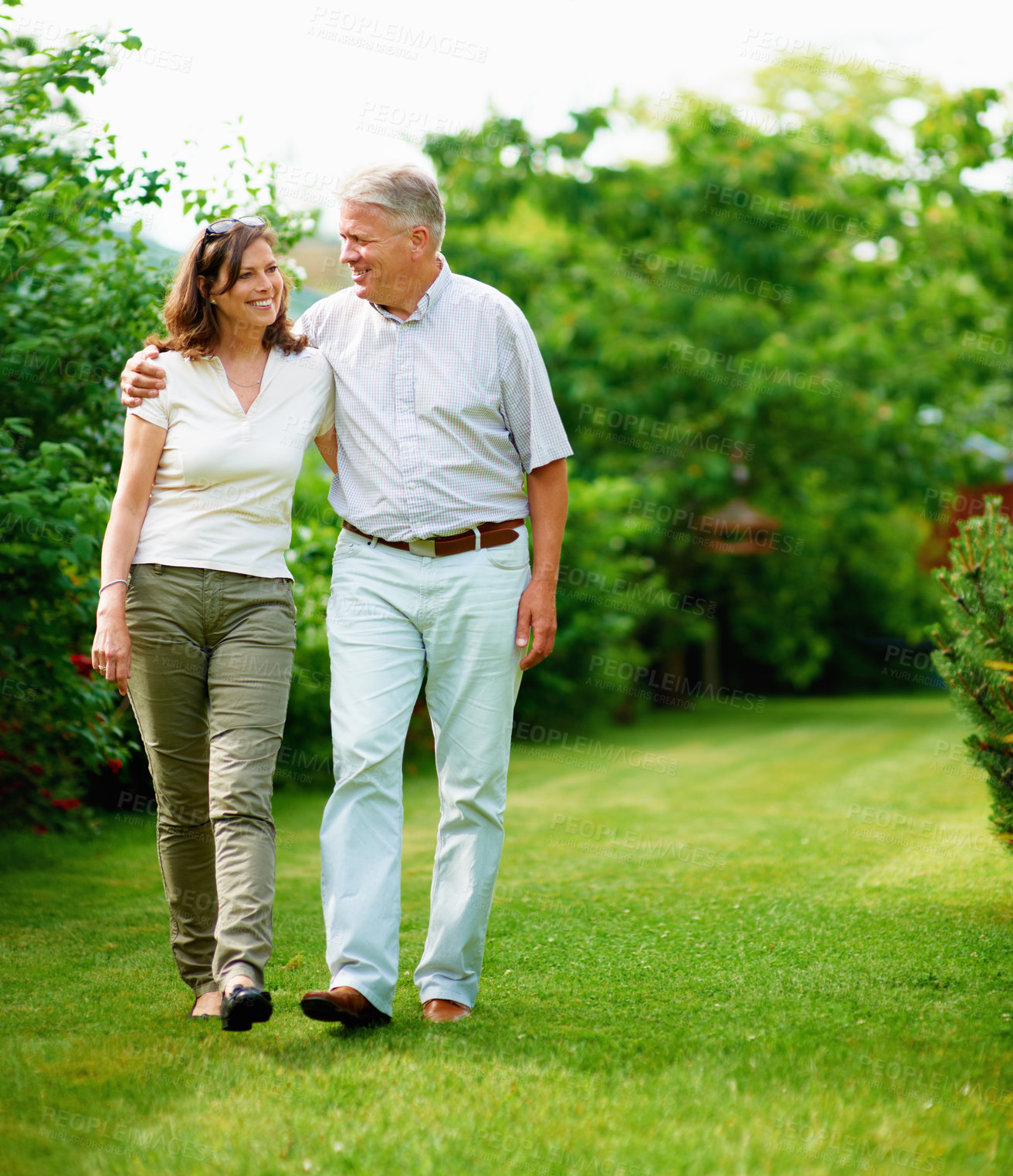 Buy stock photo Mature, garden or happy couple hug in park or nature on a outdoor romantic walk for support. Wellness, freedom or senior man with woman bonding, care or enjoying date or retirement together outside