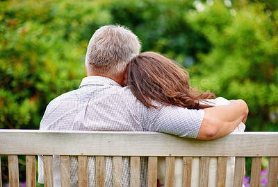 Buy stock photo Park, back view or mature couple on bench for support, trust or hope in commitment together in nature. Hug, garden or senior man bonding to relax with woman on anniversary for love, wellness or care