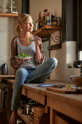 Buy stock photo Thinking, woman and eating salad in home kitchen, nutrition and fresh leafy greens for healthy diet. Food, bowl and smile of hungry person with vegetables, lunch or organic vegan meal for wellness