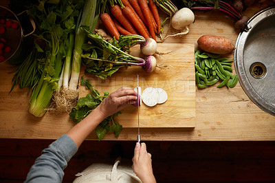 Buy stock photo Cutting, board and hands with vegetables for healthy food, cooking or preperation of soup ingredients on table. Chef or person above in kitchen with organic groceries and potato for a vegan dinner